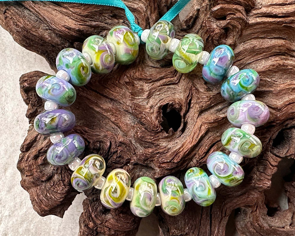 purple green lampwork beads