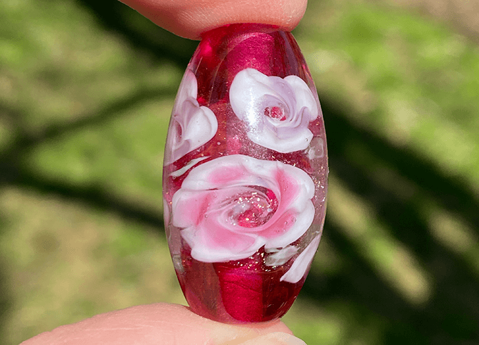 pink floral lampwork bead