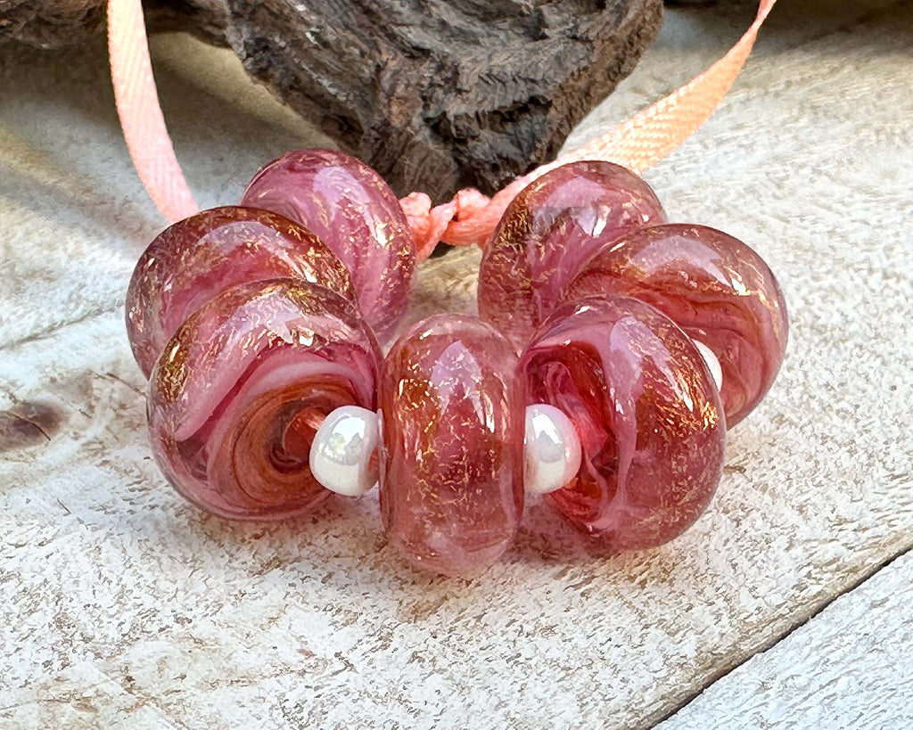 pink dichroic beads