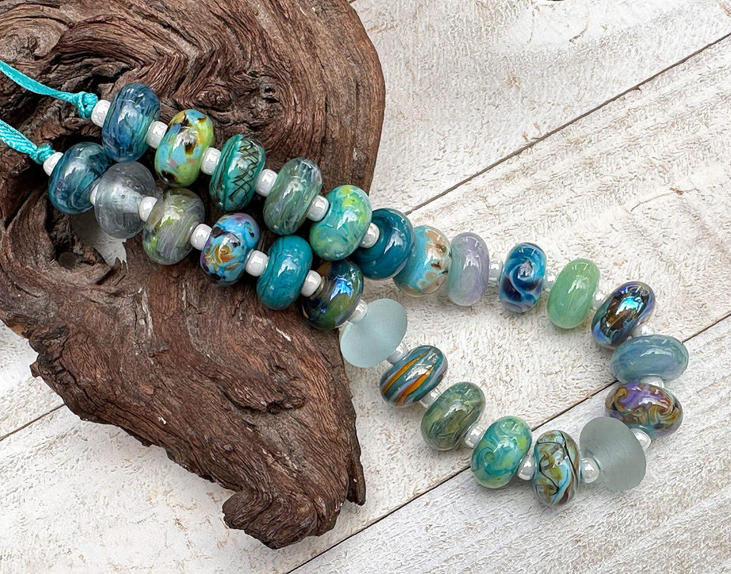 teal green lampwork beads