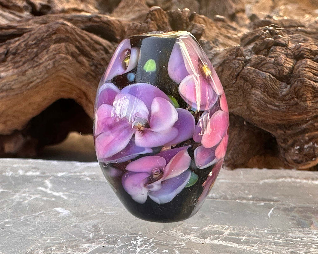 purple floral lampwork bead