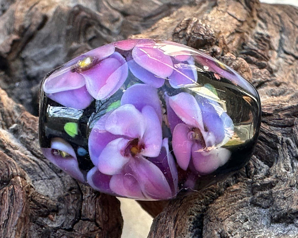 purple floral lampwork bead