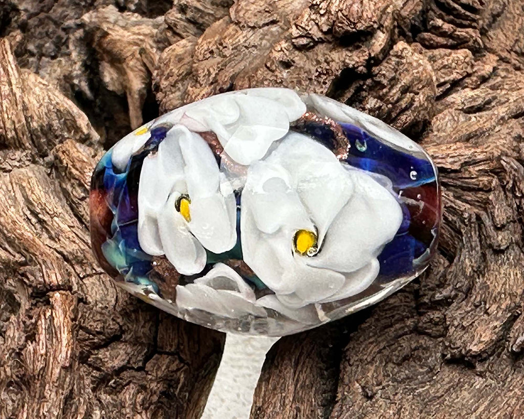 white floral lampwork bead