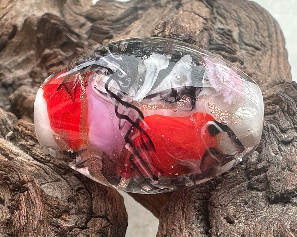 red pink lampwork bead