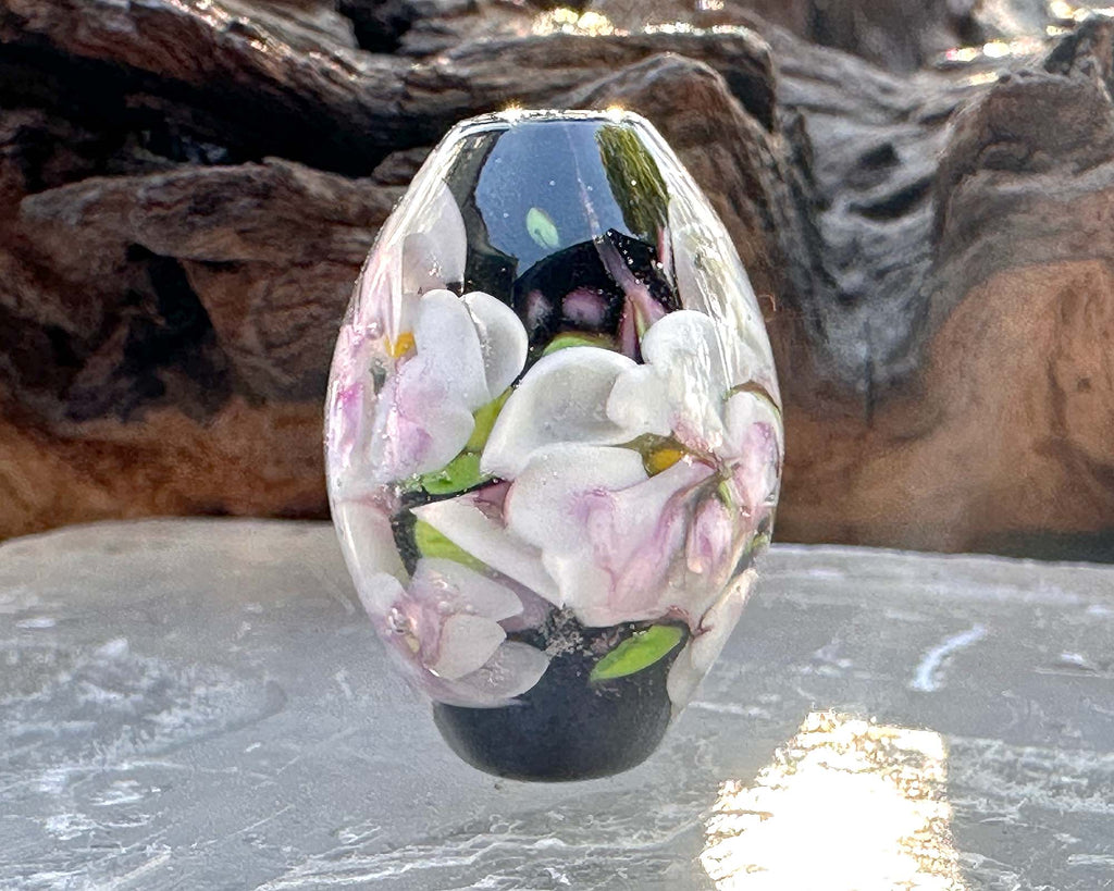 white floral lampwork bead