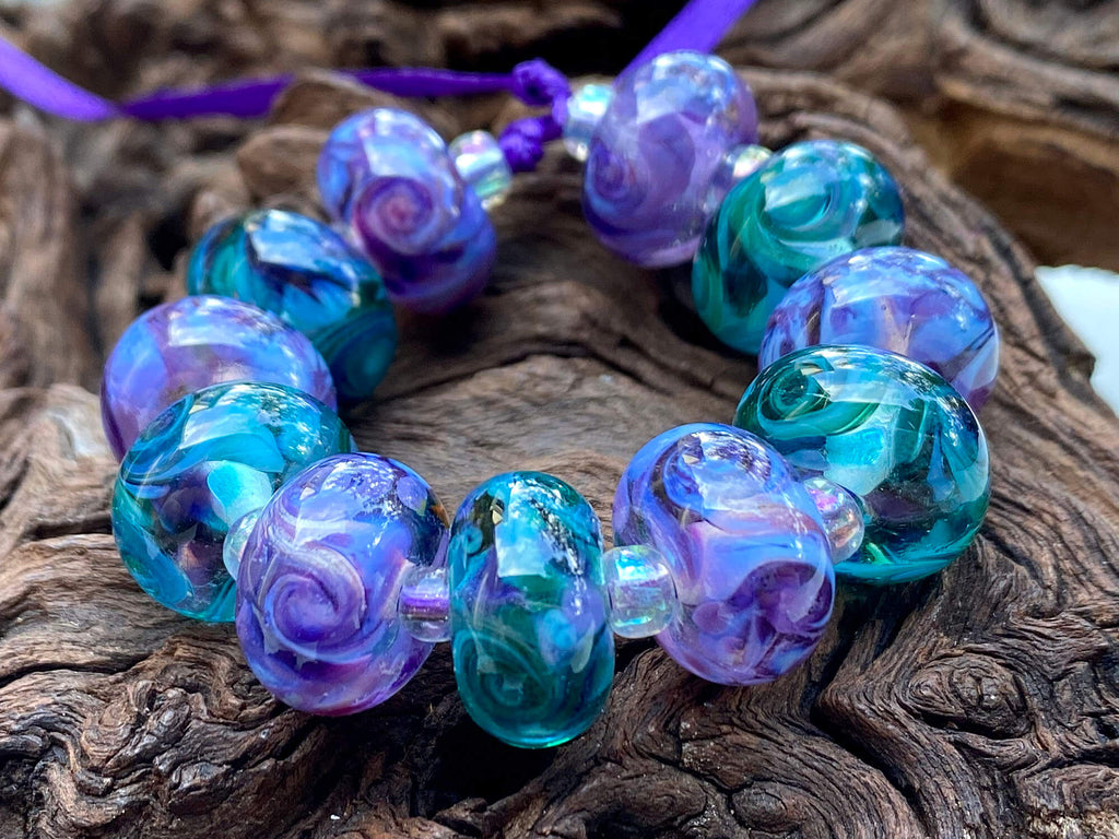 purple green lampwork beads