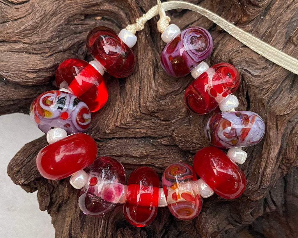 red lampwork bead set