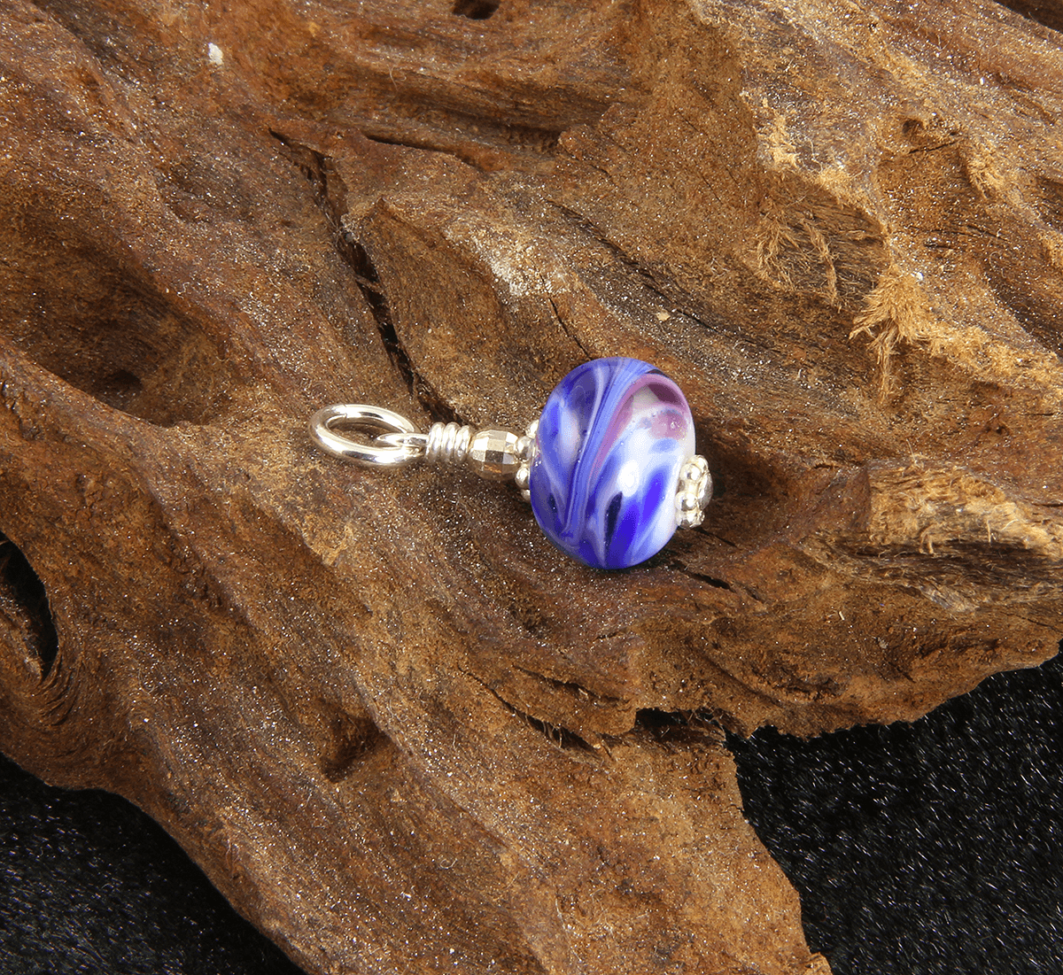 Blue swirls charm online